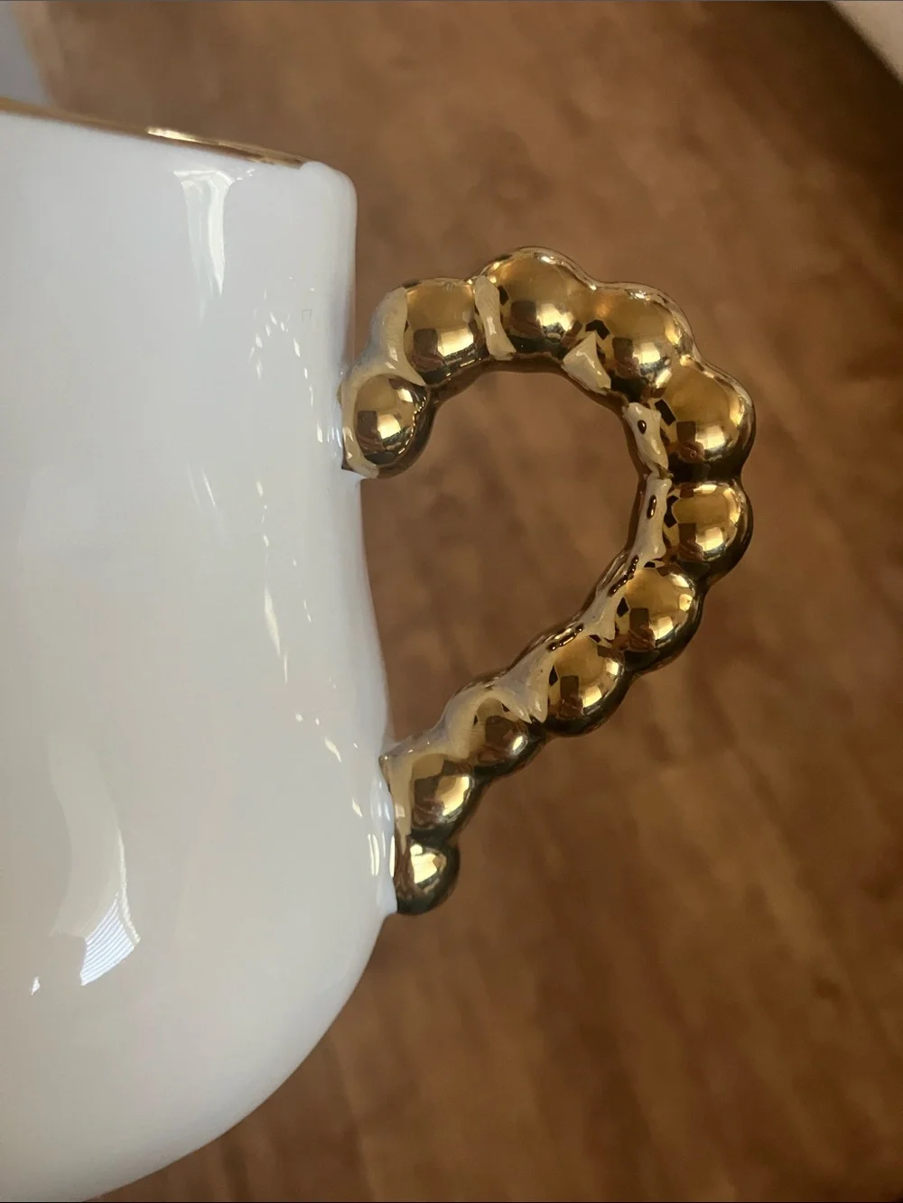White Ceramic Creamer Pitcher with Gold Accent Handle